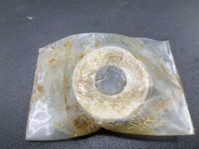 Shimmy Dampener in protective Cosmoline coating.